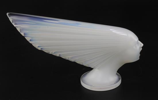 Victoire/Victory or Spirit of the Wind. A glass mascot by René Lalique, introduced on 18/4/1928, No.1147, height 14.5cm. length 25cm.